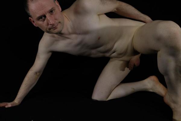 Jonathan Fredlund posing nude his shaved penis small and flaccid