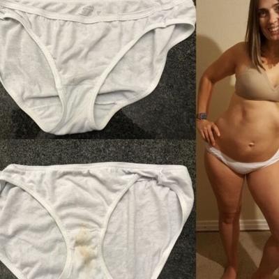 Allison posing in and showing off piss-stained white panties