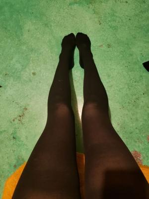 Just legs in pantyhose.