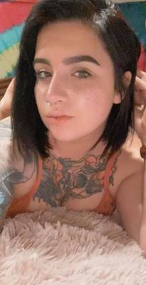 Tattooed Lyssa Showing her tight body off