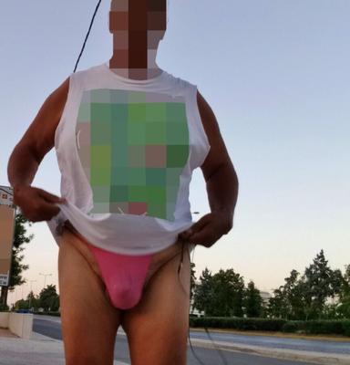 Outdoors in the streets undresing with panties