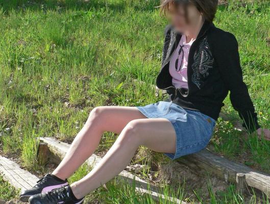 Jade in pantyhose and sneakers outdoor-