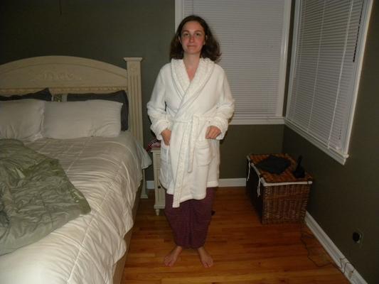 wife playing with bathrobe