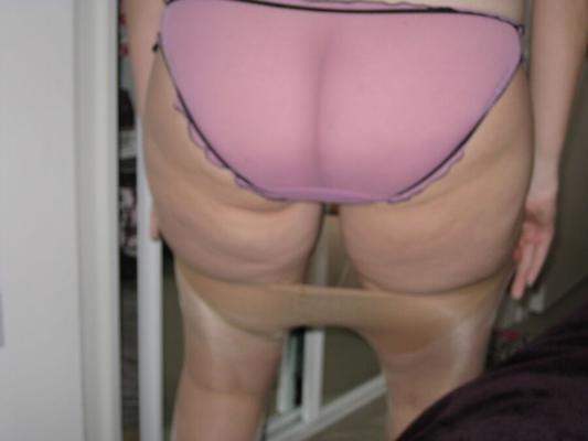 My wife in see through pink knickers and tights