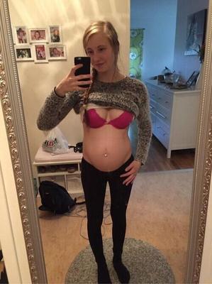 Pregnant Bitch Shows Her Belly and Sexy Red Bra