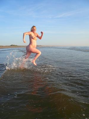 Dutch pregnant wife on the beach